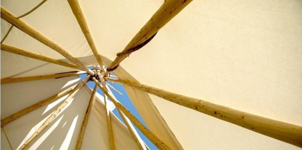 Figure&nbsp;3 &ndash; Looking up towards the sky from inside a tipi.