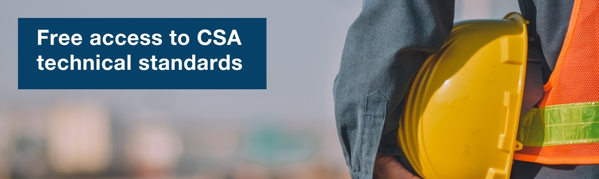 Person wearing safety vest and a hard hat